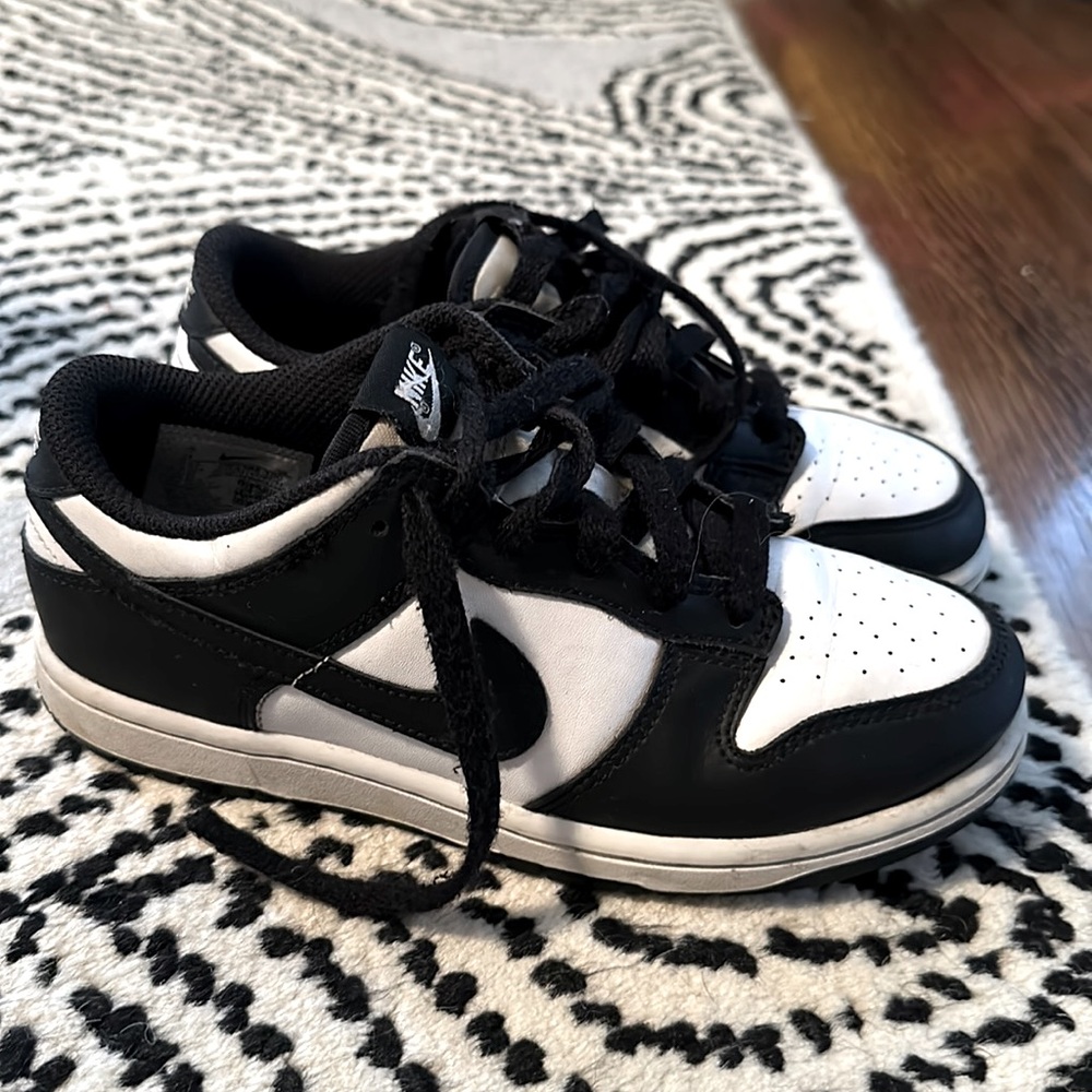 Nike kids black and white dunks. “Pandas”